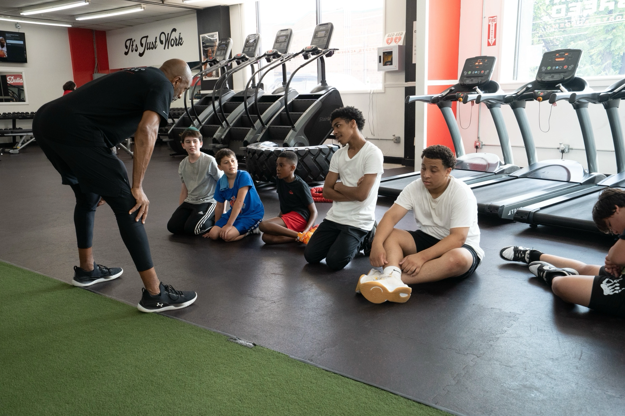 Young athletes learning nutrition and hydration at Different Breed Mini Camp